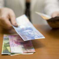 Garanţii de stat la creditele în franci. Autorităţile propun reduceri de 15% la conversia în lei